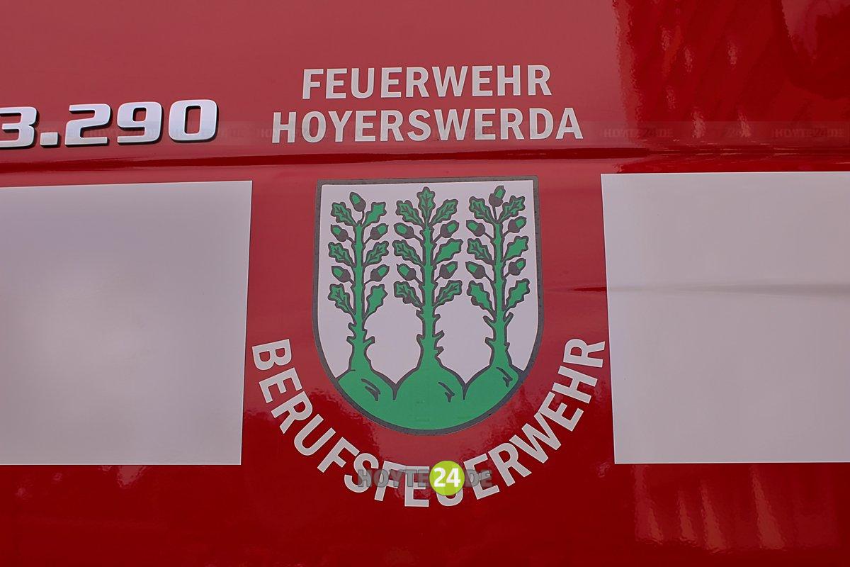 Man sieht das Symbol Berufsfeuerwehr Hoyerswerda.