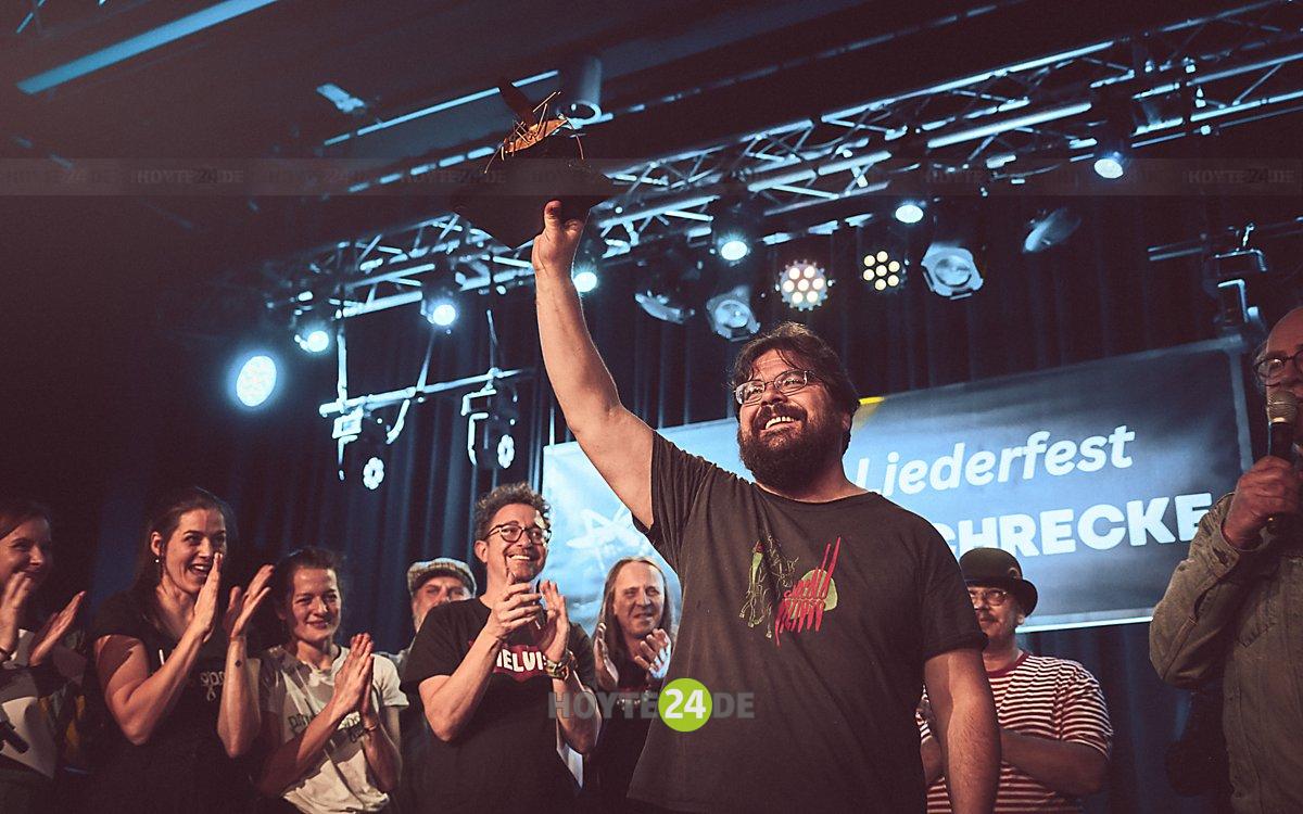 Man sieht Paul Geigerzähler mit der Sieger-Hoyschrecke.