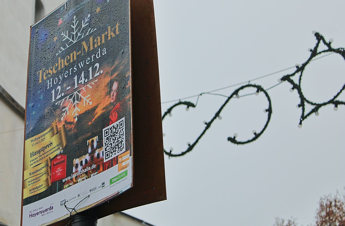 Man sieht ein Teschenmarkt-Plakat.