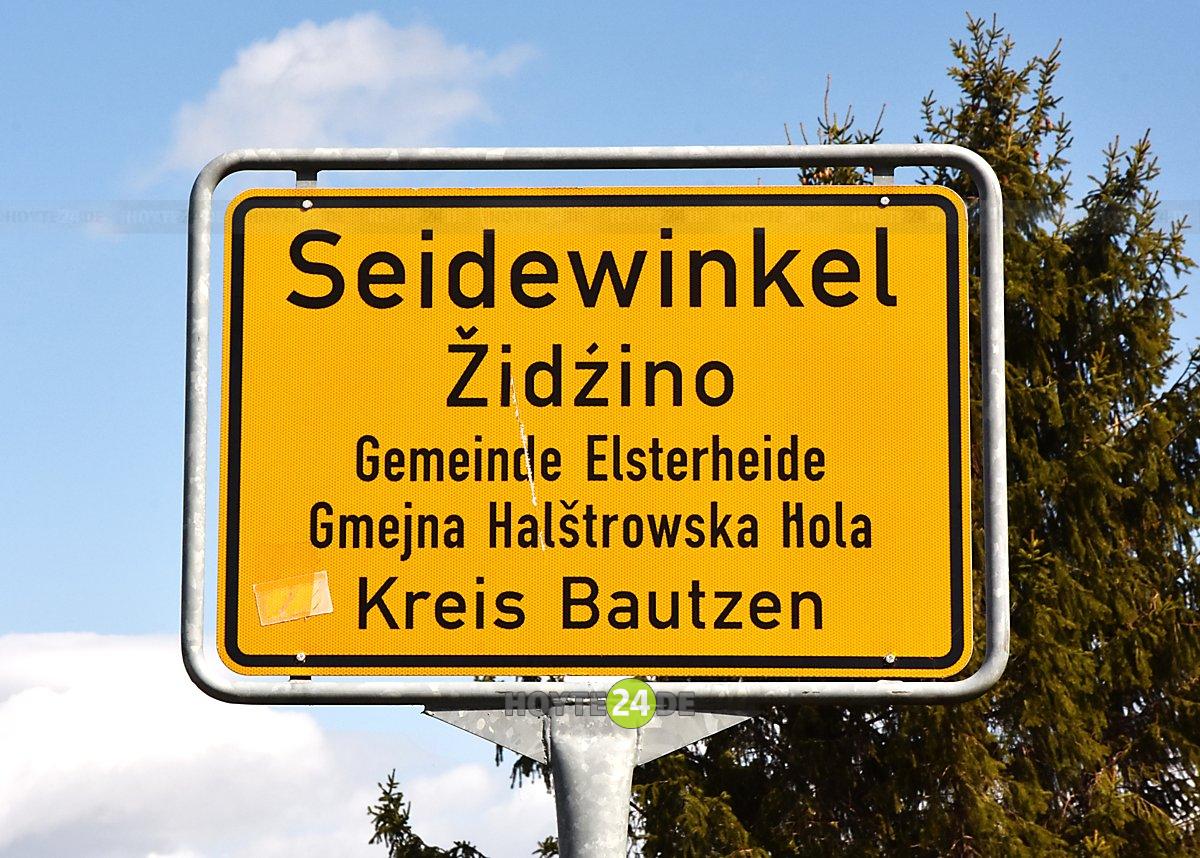 Man sieht das Ortseingangsschild von Seidewinkel,